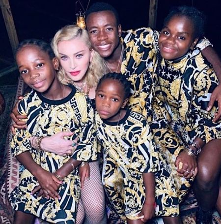 Madonna with her children David Banda, Esther and Stella Mwale and Lourdes Leon.